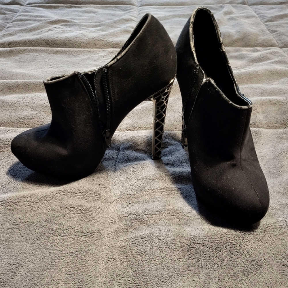 Women's Call it Spring black booties, heels with gold on the heel. Size 7
